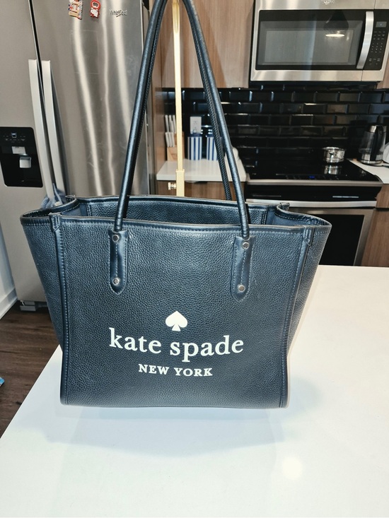 kate spade Handbags - kate spade black leather logo tote with white print